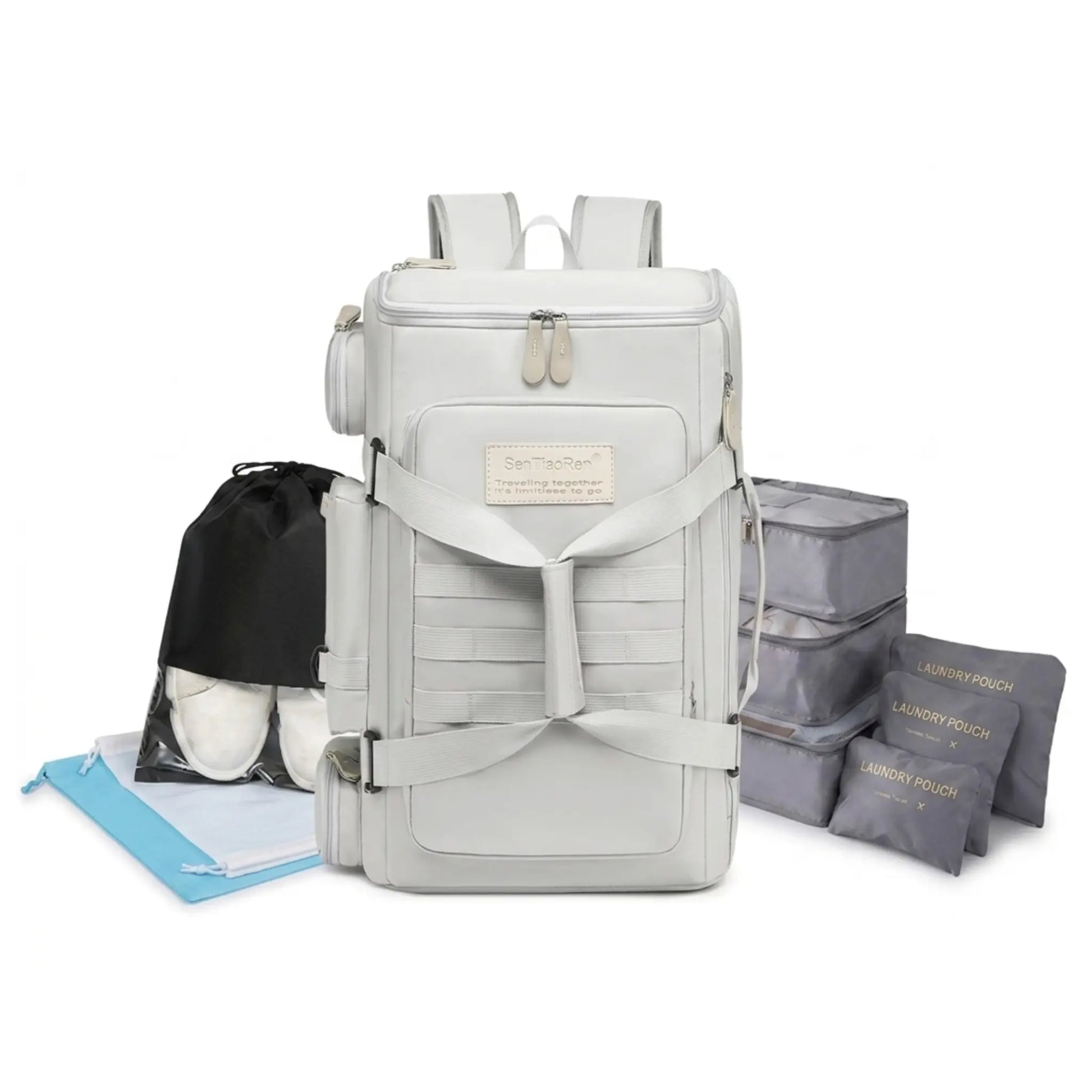 ערכת נסיעות FlexPack מבית KitFlow בצבע לבן-אפור הכוללת תיק גב, אירגוניות לאריזה ונרתיקי נעליים לשמירה על סדר במהלך הטיול